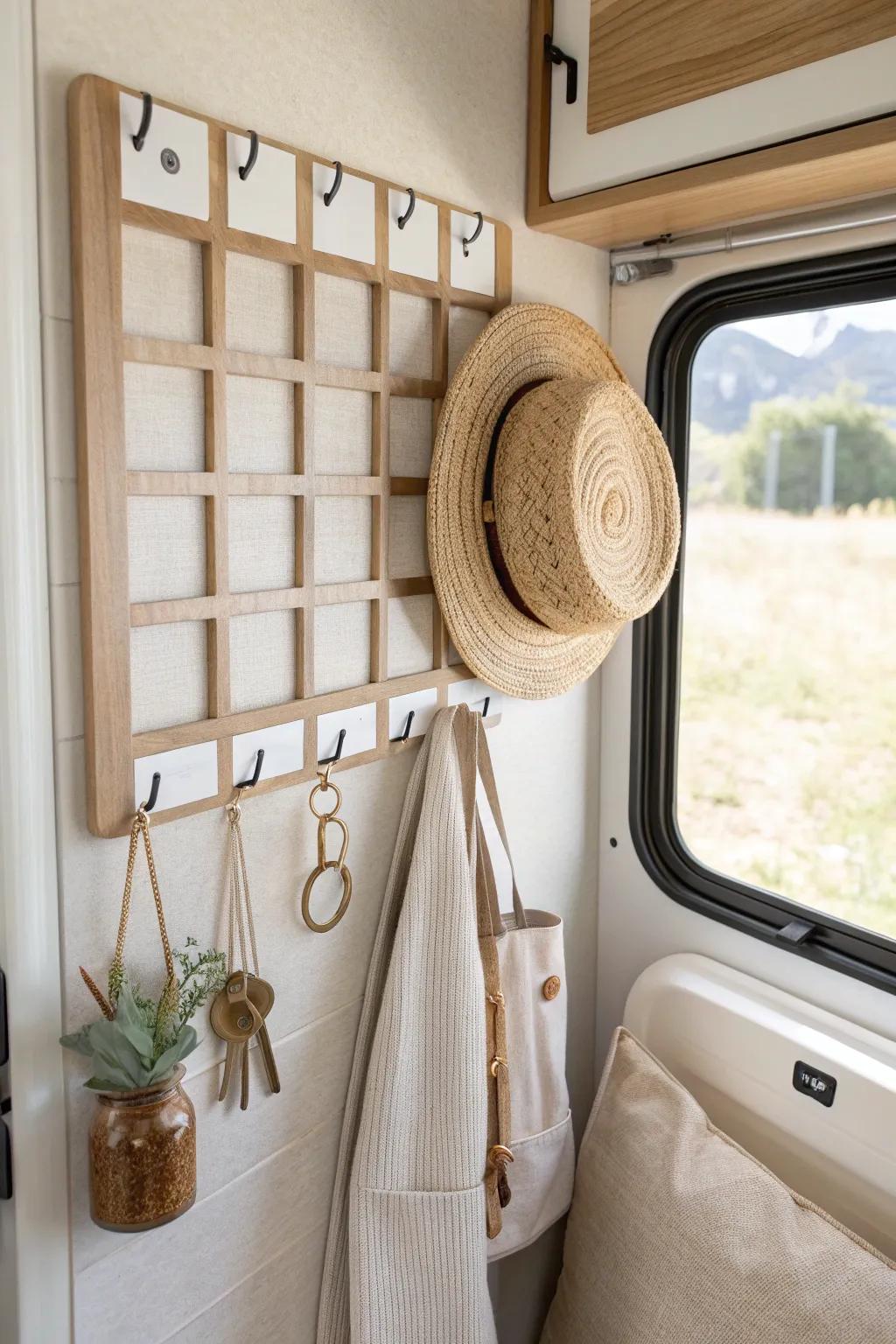 A chic command-hook grid turns your RV entry wall into stylish storage—no drilling needed.