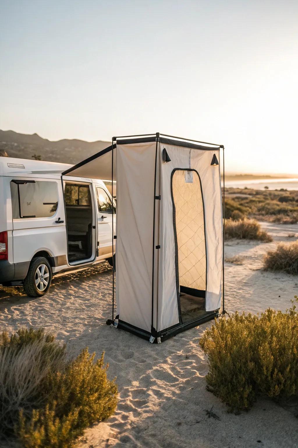 Pop-up shower tent beside the van—spa-like privacy in seconds for tiny-space living.