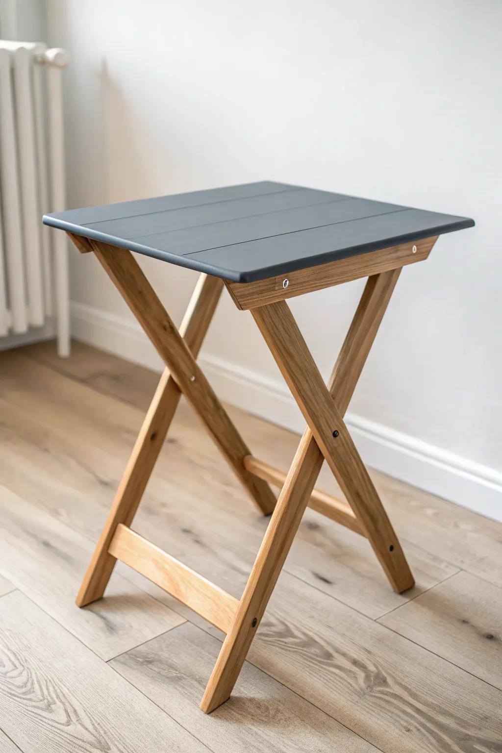 A matte charcoal tabletop instantly upgrades a folding table into a modern mini desk.