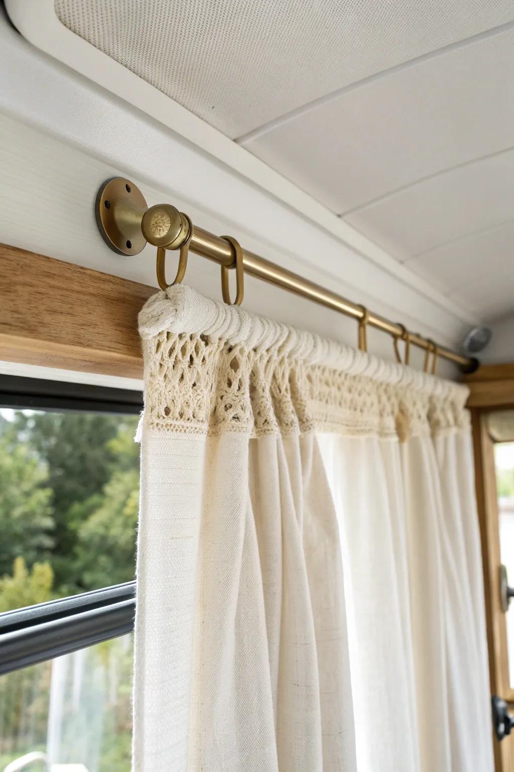 Hang the curtain rod higher to make your camper walls feel taller—bright, airy, and cozy.