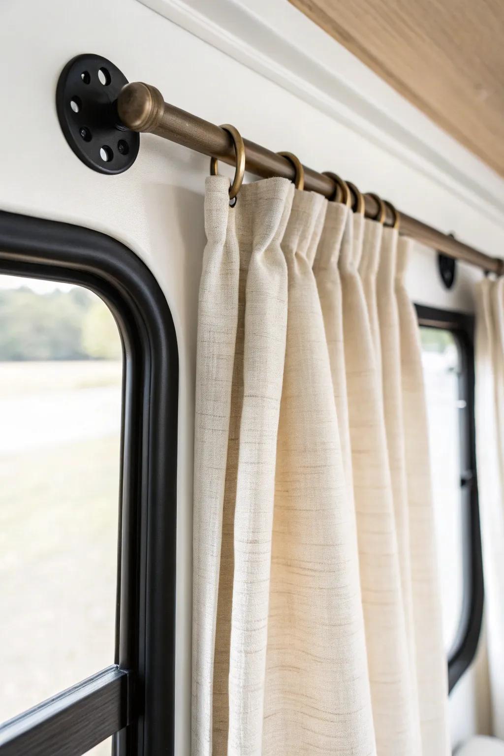 Wrap-around rods tuck curtains to the wall, blocking that pesky side glow for pitch-dark RV sleep.