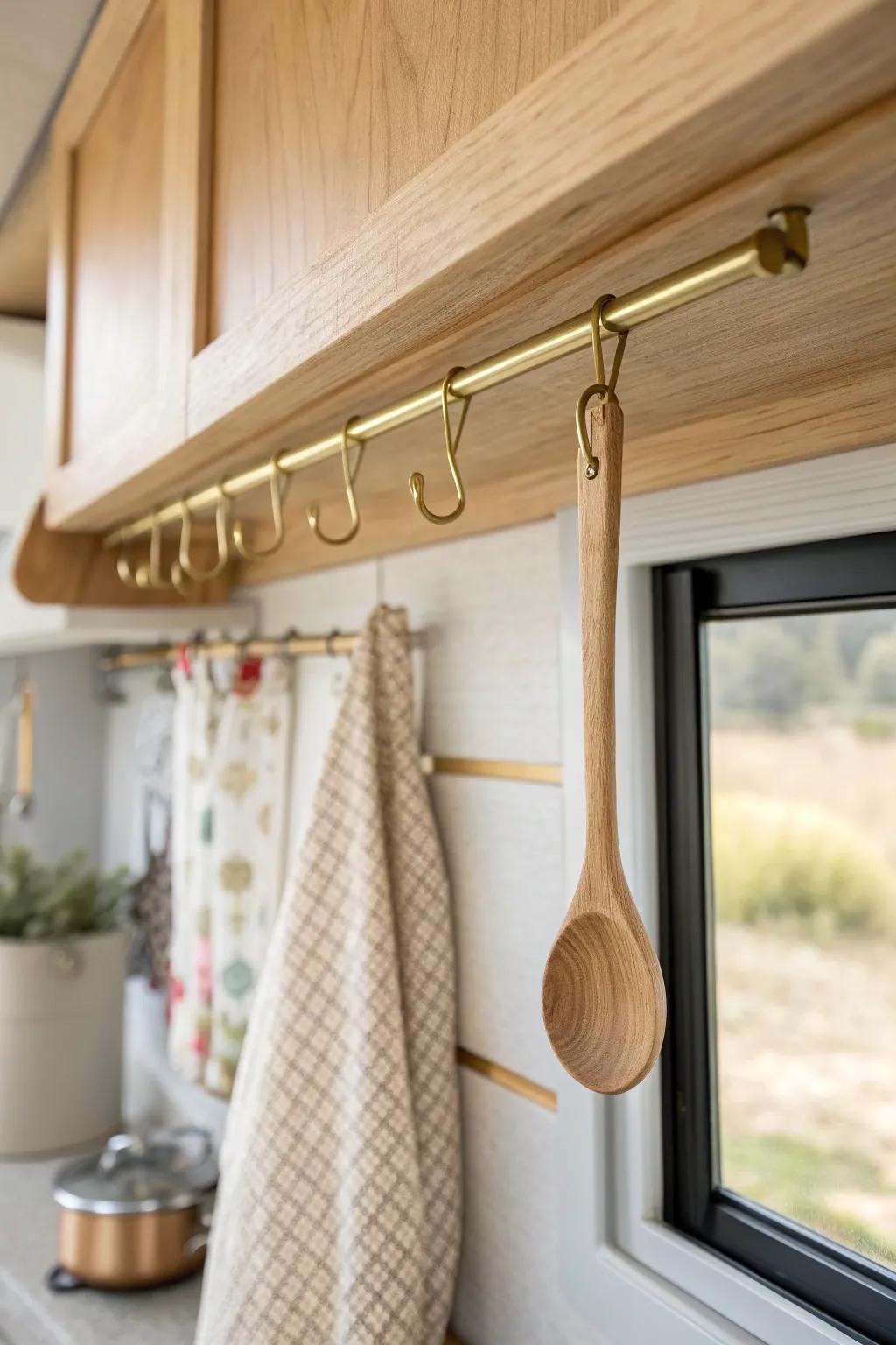 Add a slim under-cabinet hook rail to keep your go-to utensil within easy reach.