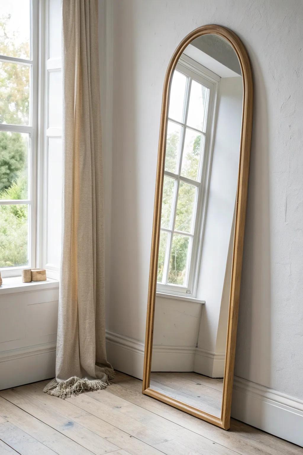 Place a large mirror across from your brightest window to bounce daylight and open up your space.