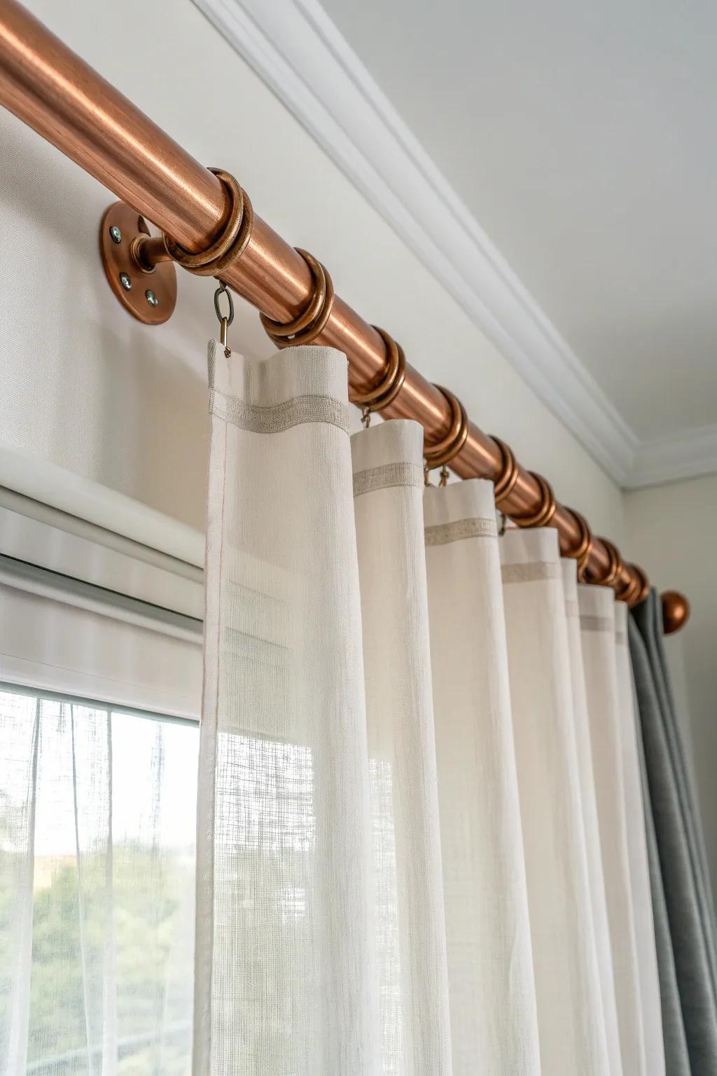Upgrade your space with the sophisticated allure of copper pipe curtain rods.