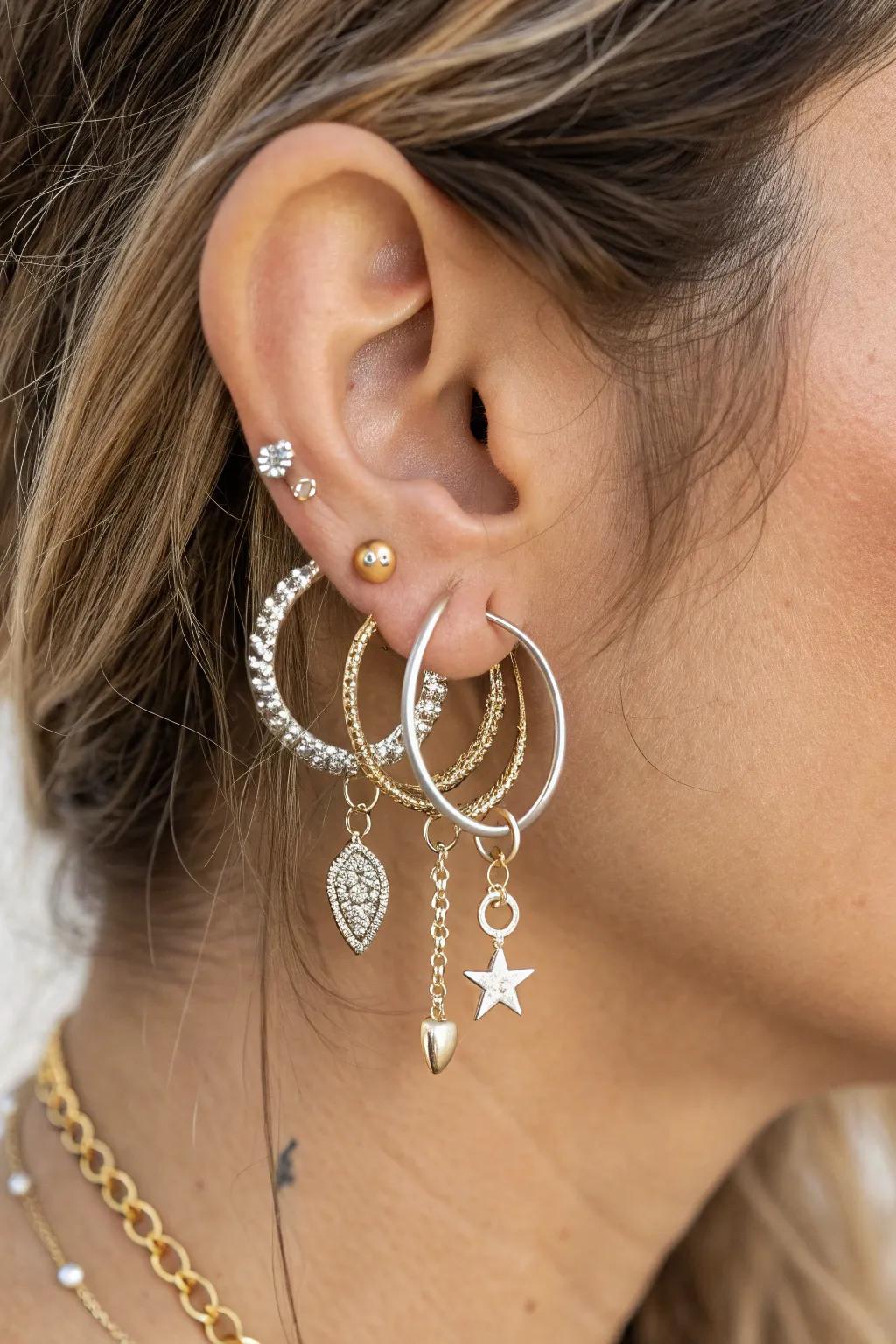 Elevate your style with a bold, minimalist earring cluster that speaks volumes. #EarringArrangement #ScandiBohoChic
