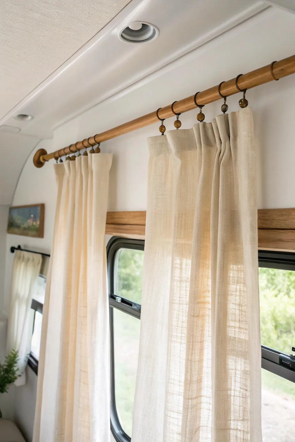 Hang rods high and wide to make mobile home windows feel taller, brighter, and larger.
