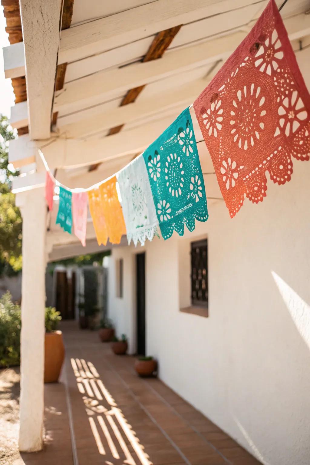 Papel picado overhead adds festive color to a tiny patio—no floor space required.
