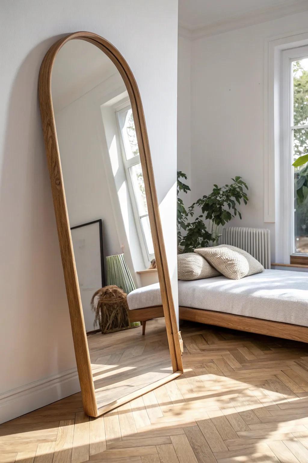 Lean a big mirror behind the daybed to bounce light and make a small corner feel twice as wide.