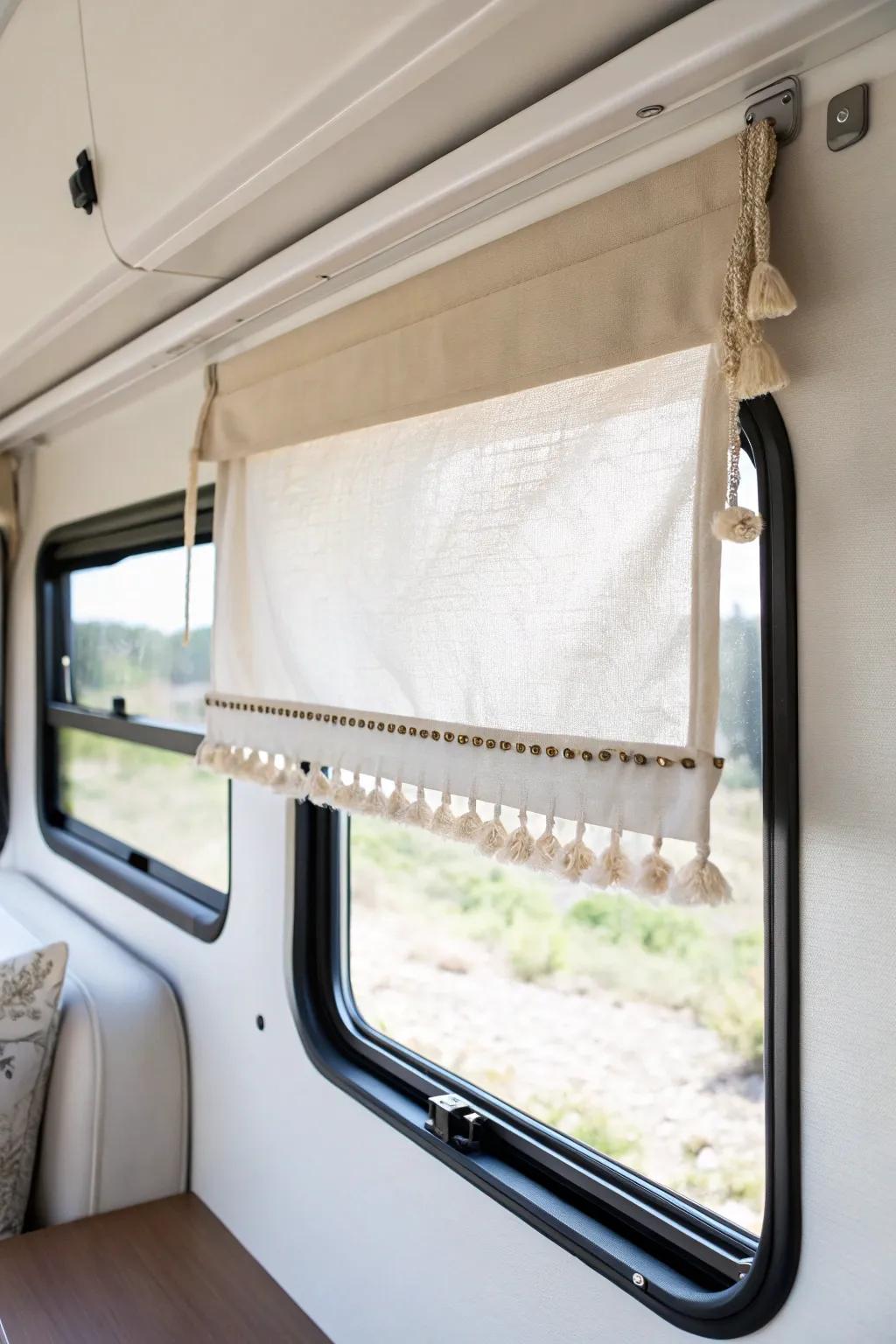 A clean roller shade layered with a soft valance adds privacy and instant RV polish.