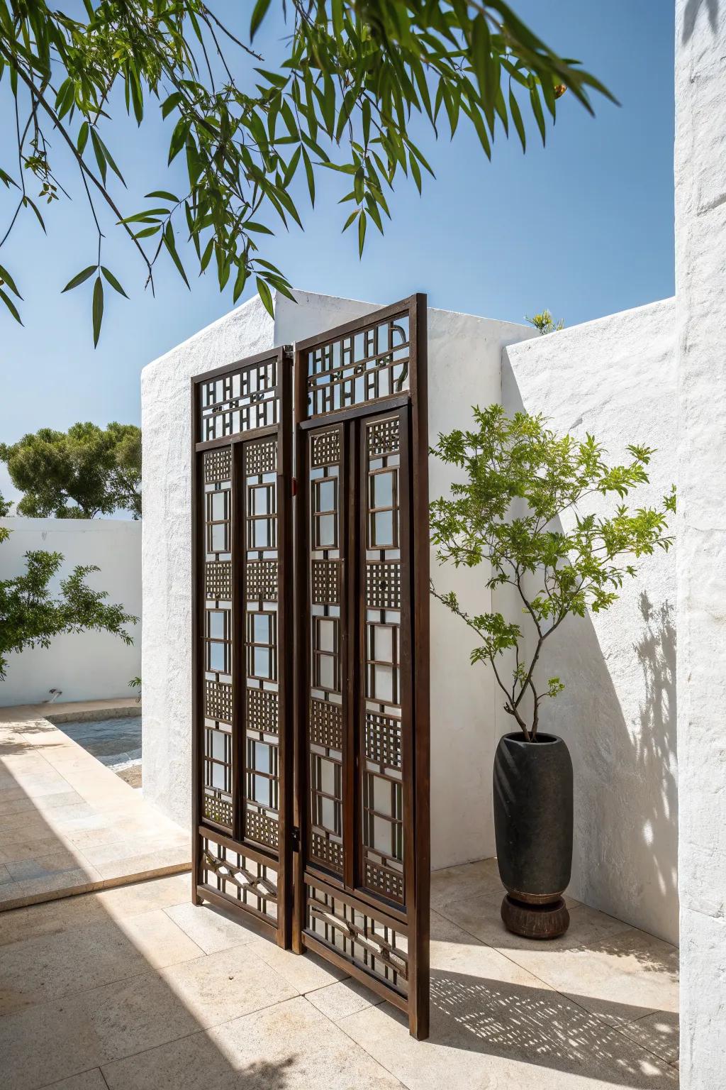 A slim lattice screen borrows sky and branches—making a tiny yard feel twice as big.