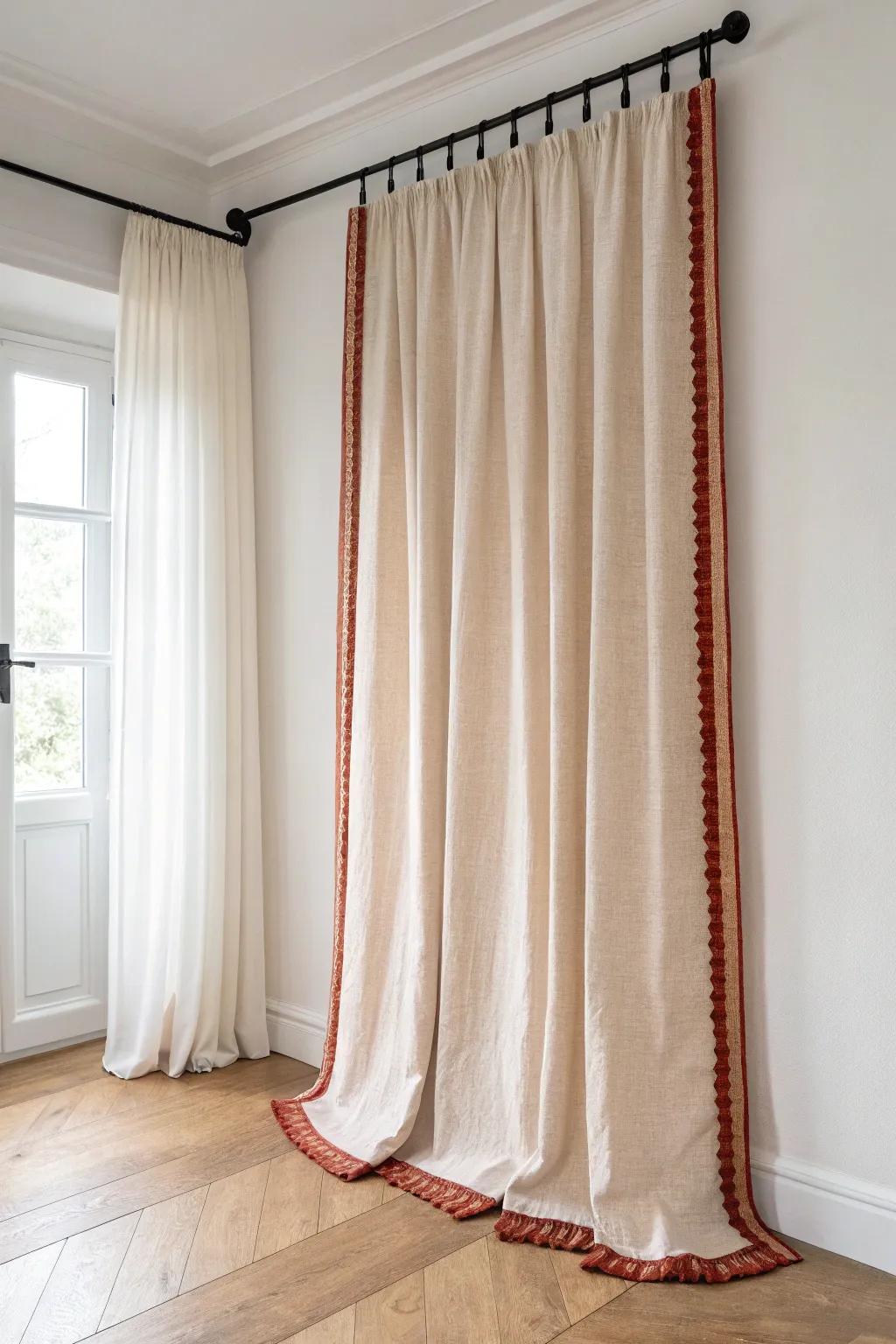 Hang curtains high and wide to instantly lift a small den and make the ceiling feel taller.