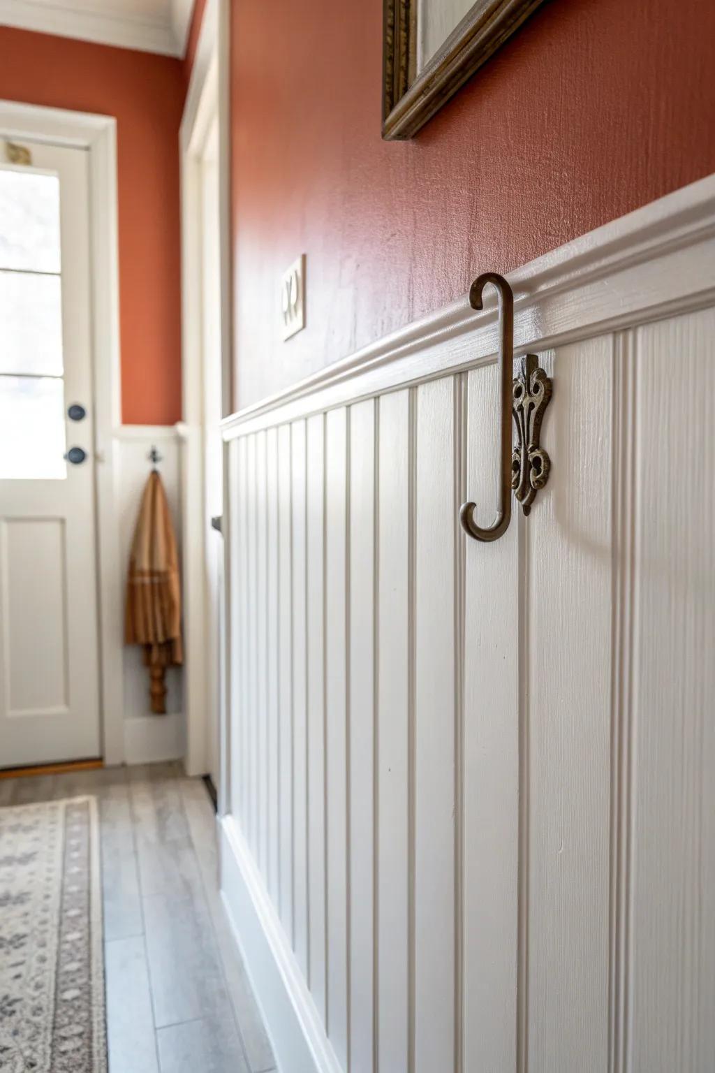 Try wainscoting: bold board-and-batten adds structure to a narrow hallway and hides scuffs.