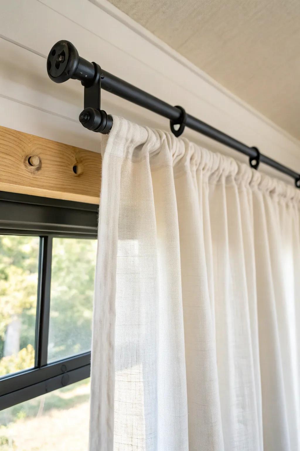Hang curtains high and wide—sheer panels add light and make low ceilings feel taller.