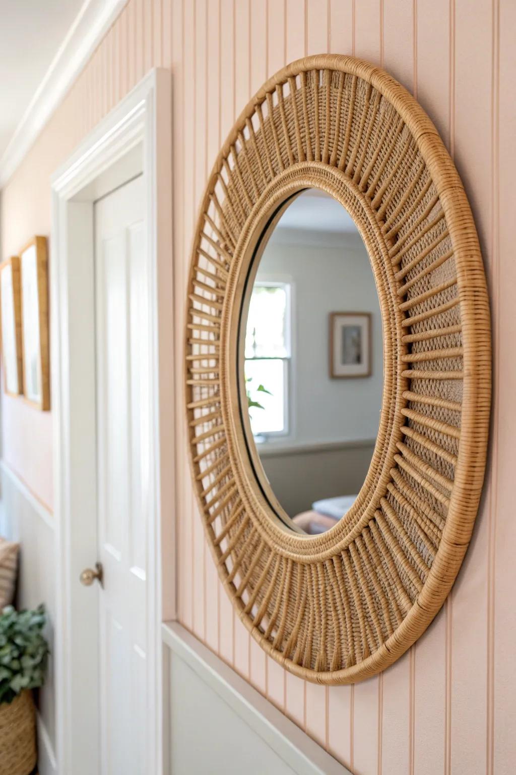 Paint it bright and tonal—one warm rattan mirror brings airy calm to the smallest entryway.
