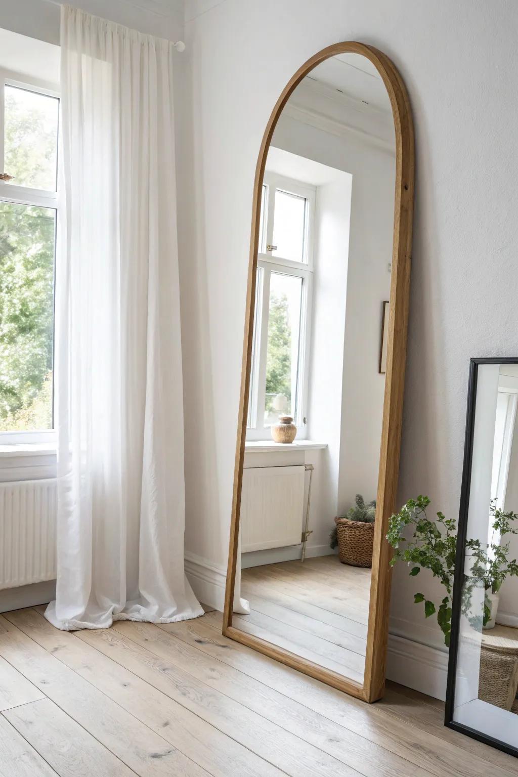 Lean a full-length mirror in a dead corner to bounce light and instantly widen the room.