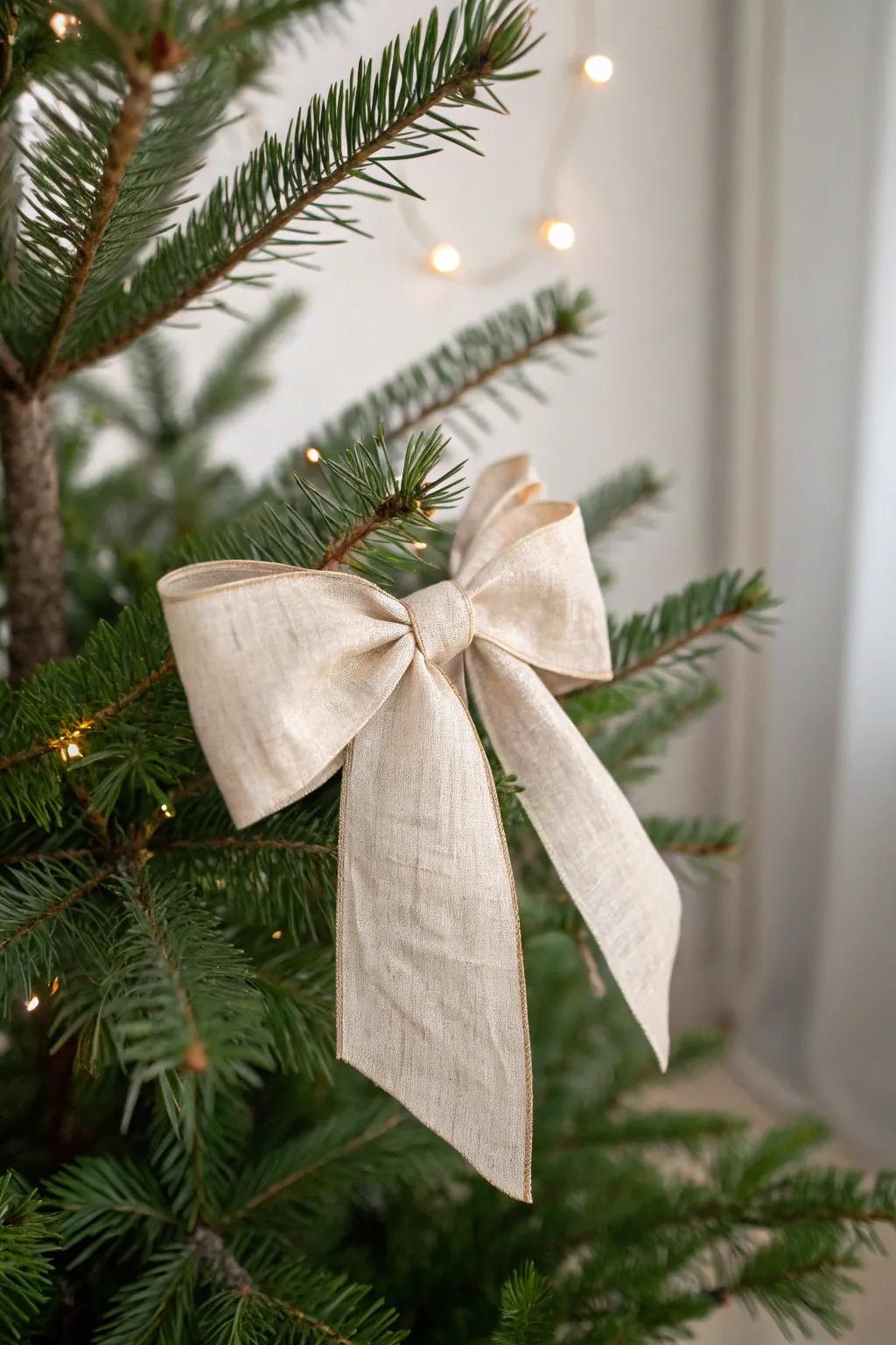 Matte linen ribbon bows add soft, minimalist charm to your Christmas tree—no clutter needed.