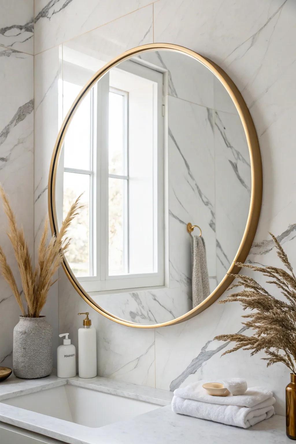An oversized mirror doubles the light, making white marble look brighter and the space feel bigger.